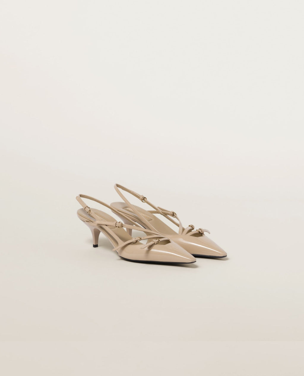 Miu Miu Patent leather slingbacks with buckles Beige
