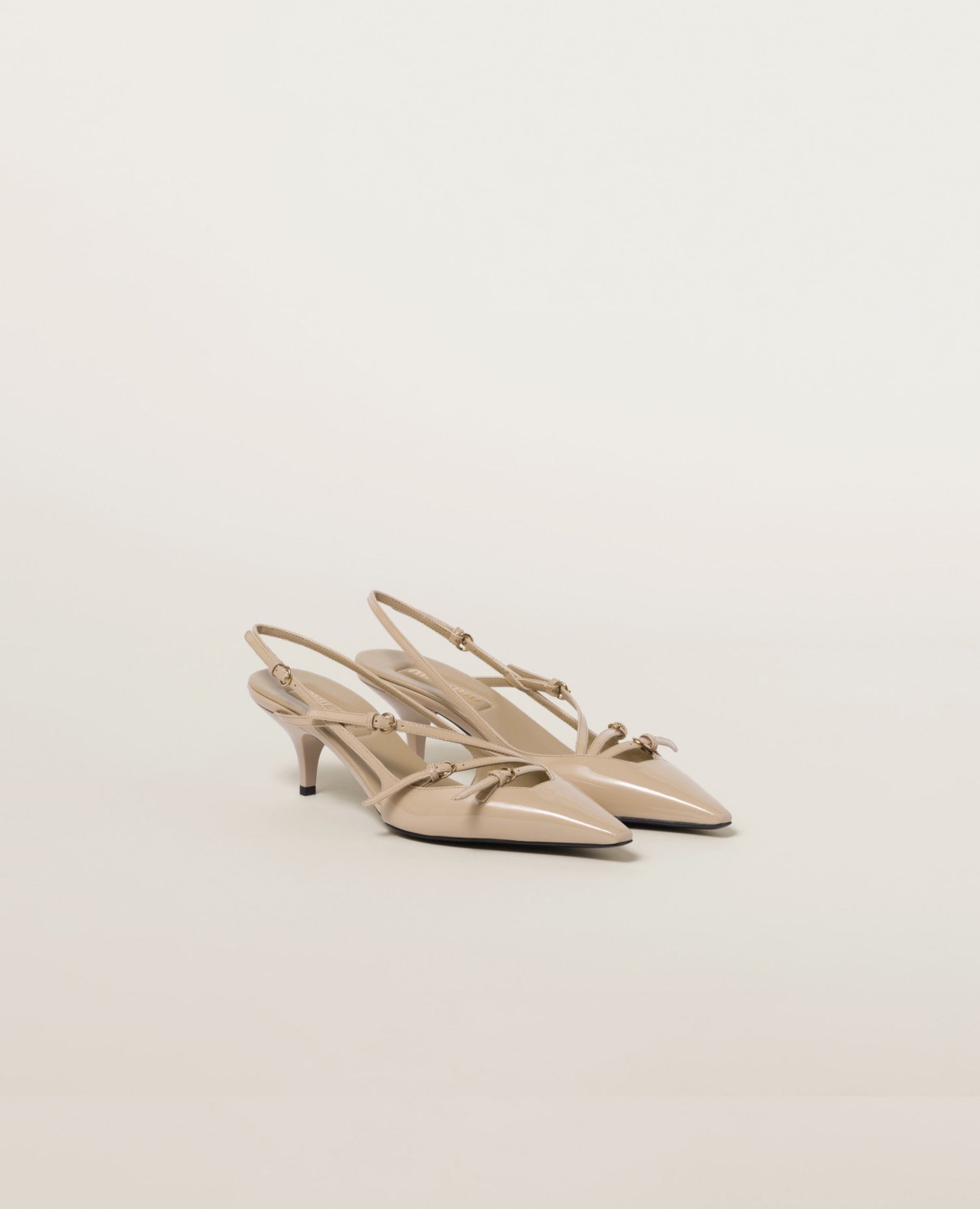 Miu Miu Patent leather slingbacks with buckles Beige