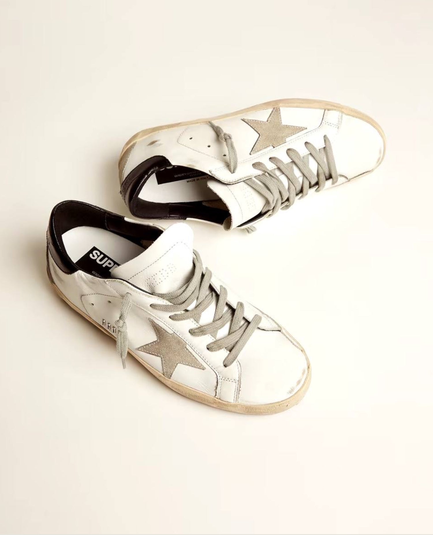 Golden Goose Super-Star with black heel tab and metal stud lettering