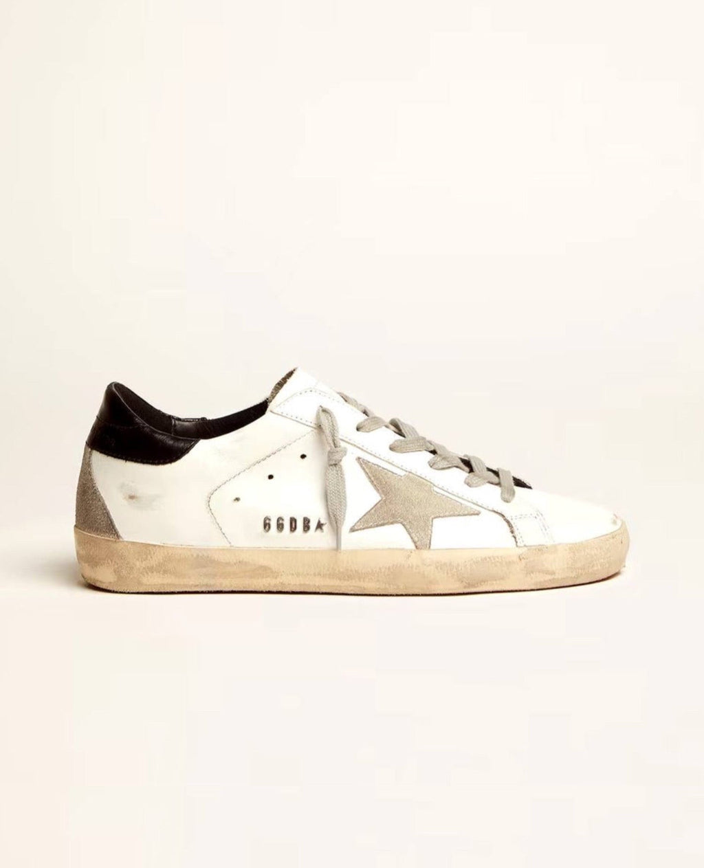 Golden Goose Super-Star with black heel tab and metal stud lettering